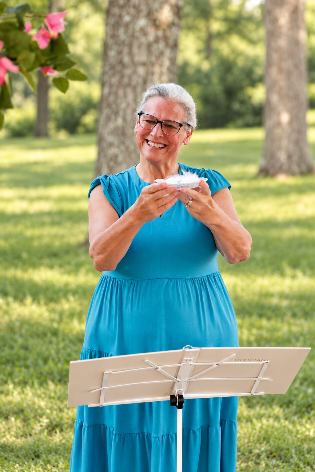 Beth holding rings during a ceremony